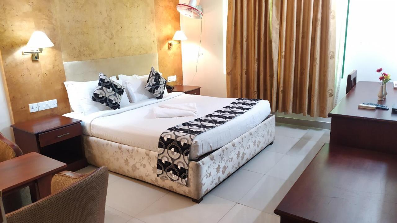 Hotel Bessota International Tiruvalla Exterior photo