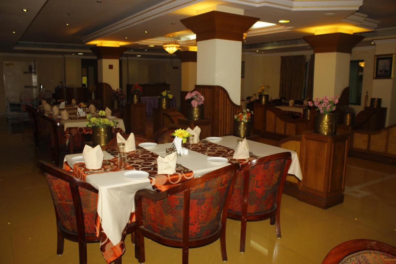 Hotel Bessota International Tiruvalla Exterior photo