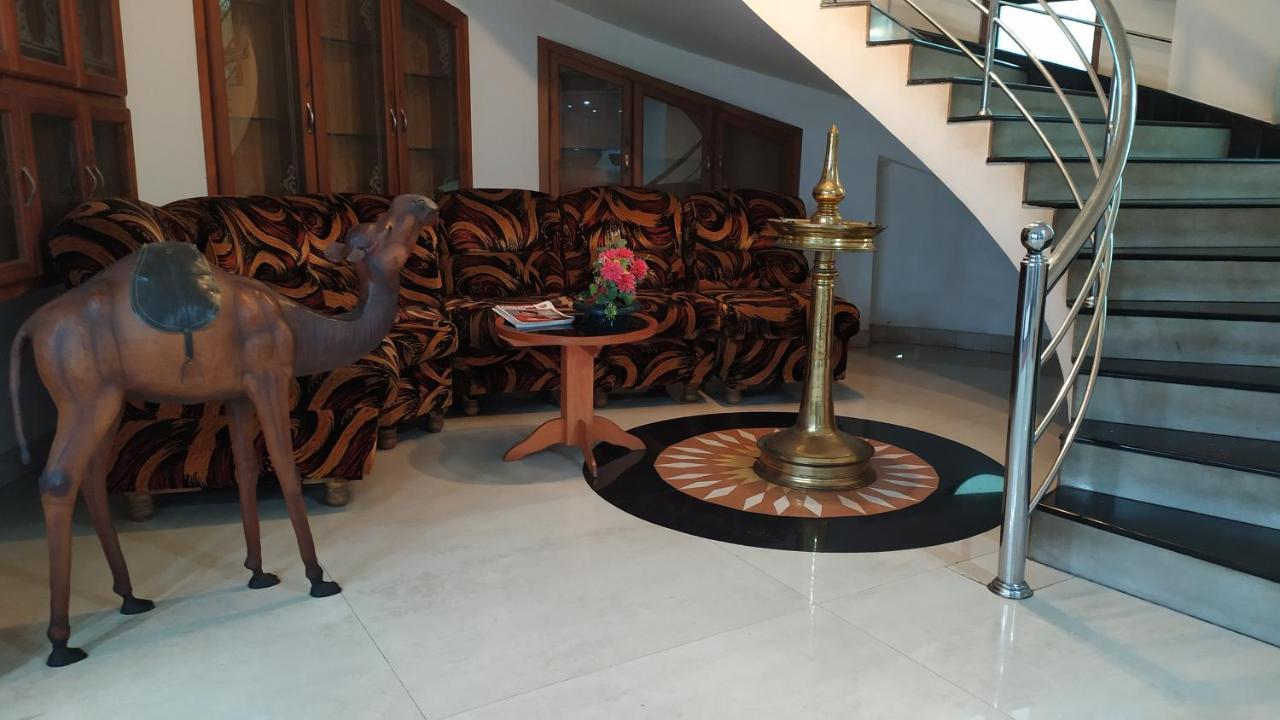 Hotel Bessota International Tiruvalla Exterior photo