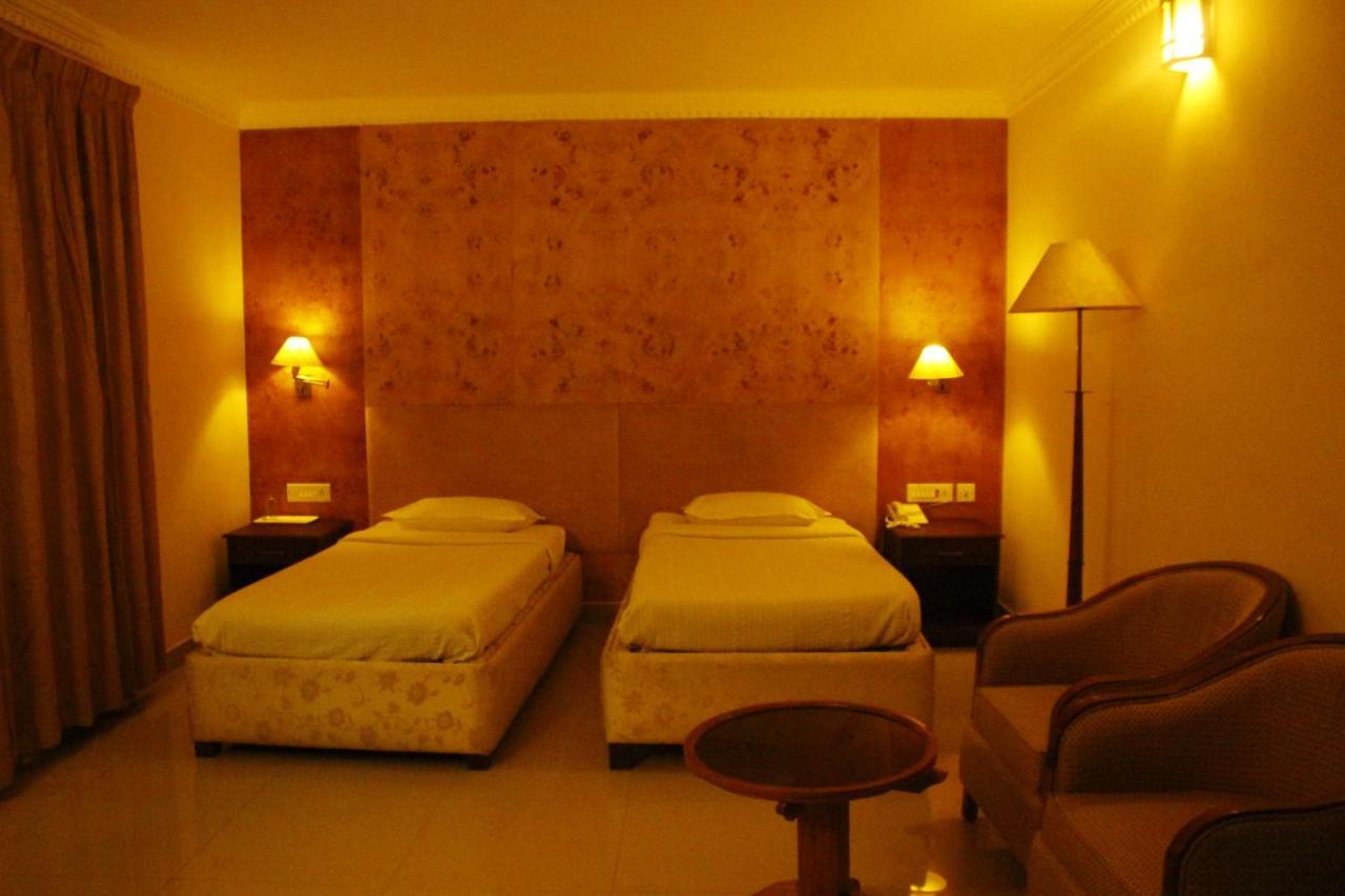 Hotel Bessota International Tiruvalla Exterior photo
