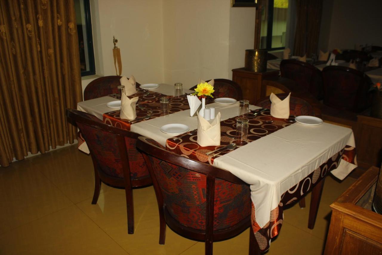 Hotel Bessota International Tiruvalla Exterior photo